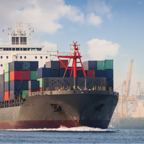 A ship transporting goods through sea